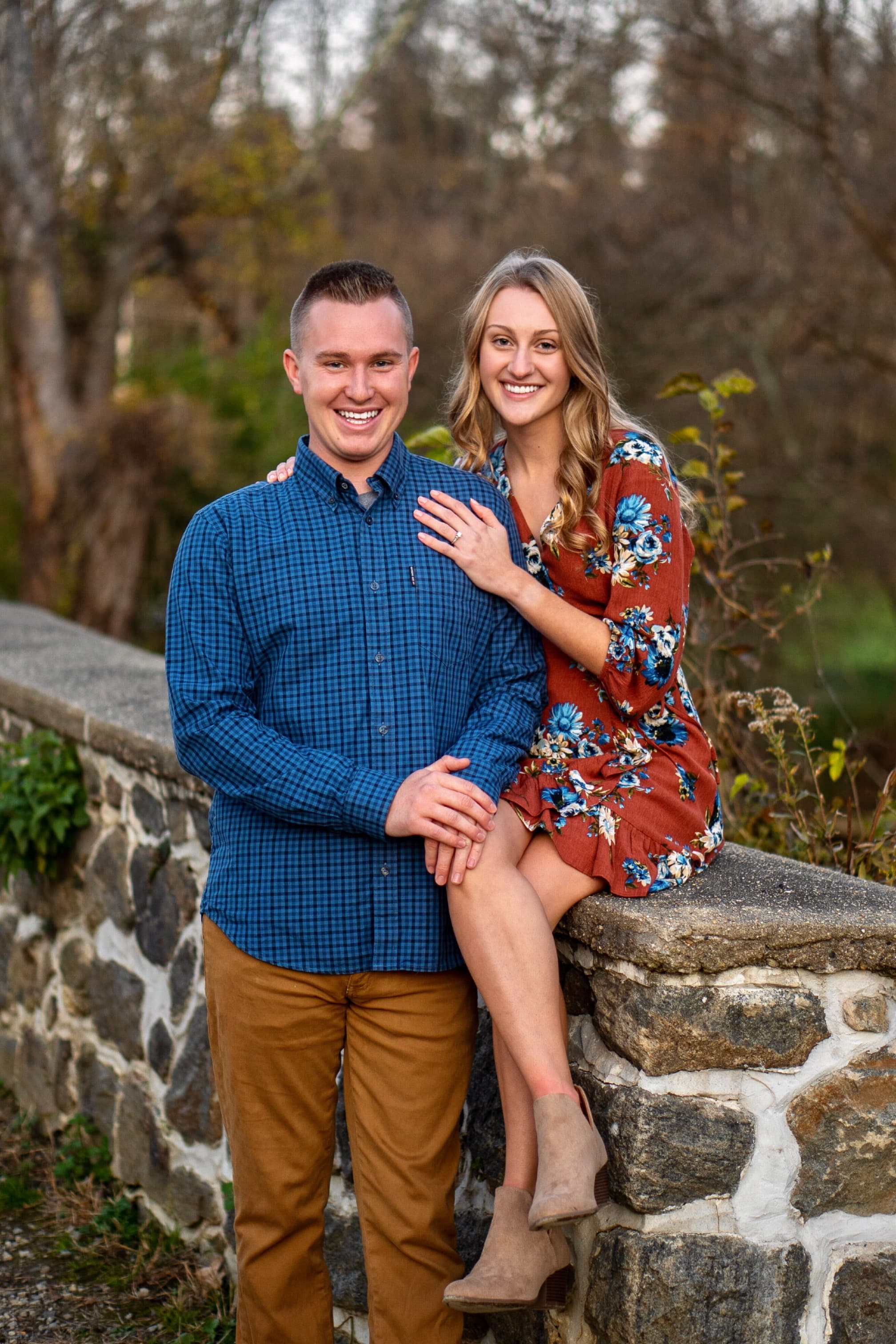 Couple portrait, stone bridge at golden hour